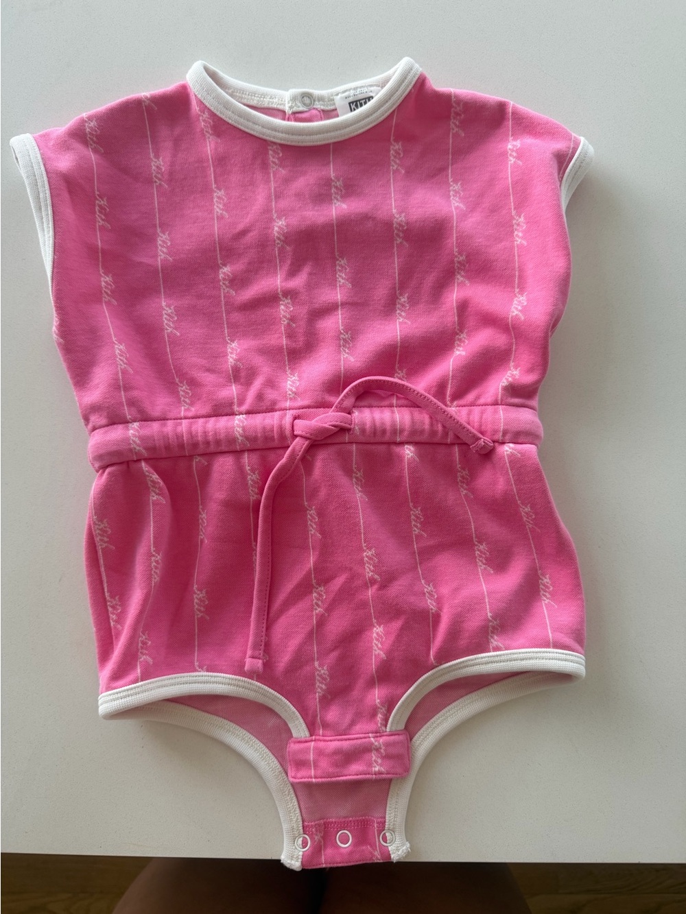 Kith Pink Bodysuit Romper with White Trim